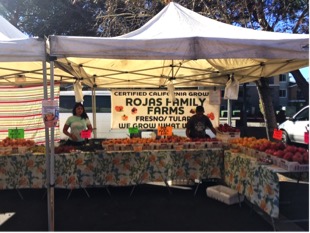 Rojas Family Farm booth at the farmers' market