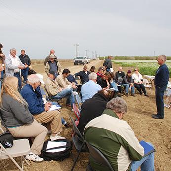 Seated participants at a conservation tillage field day