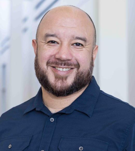 Headshot of smiling man
